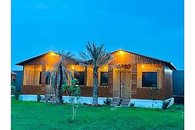 Authentic Eco-Luxury Wooden Chalets at Krishna Farm